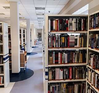 library shelves with lots of books