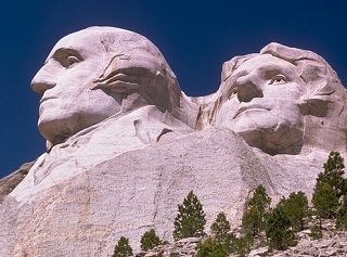 photo of Mt. Rushmore and the carved faces of Washington and Jefferson