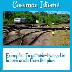 'Common Idioms. Example: to get side-tracked is to turn aside from the plan.'
Photo of a railroad yard with several side tracks leading off the main track.