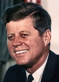 John F. Kennedy smiling-- a public domain photo