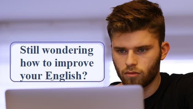 A young man staring at his computer, thinking
test: Still wondering how to improve your English?